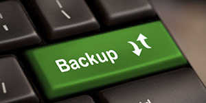Backup Computer Key In Green For Archiving And Storage